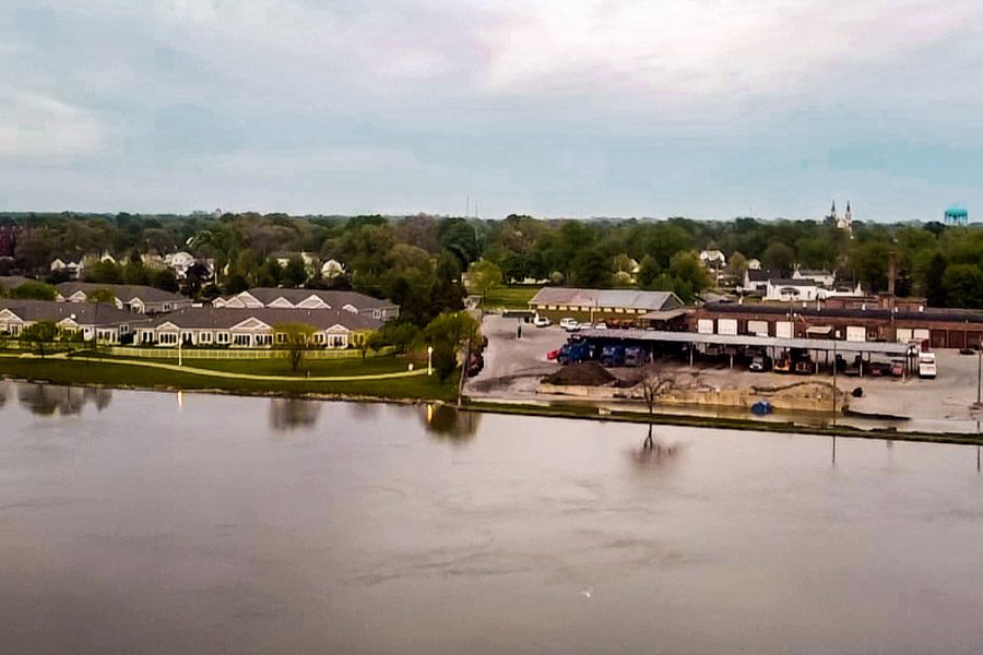 About Our Agency - Aerial View of Bay City, Michigan and Surrounding Area Along River on a Cloudy Day